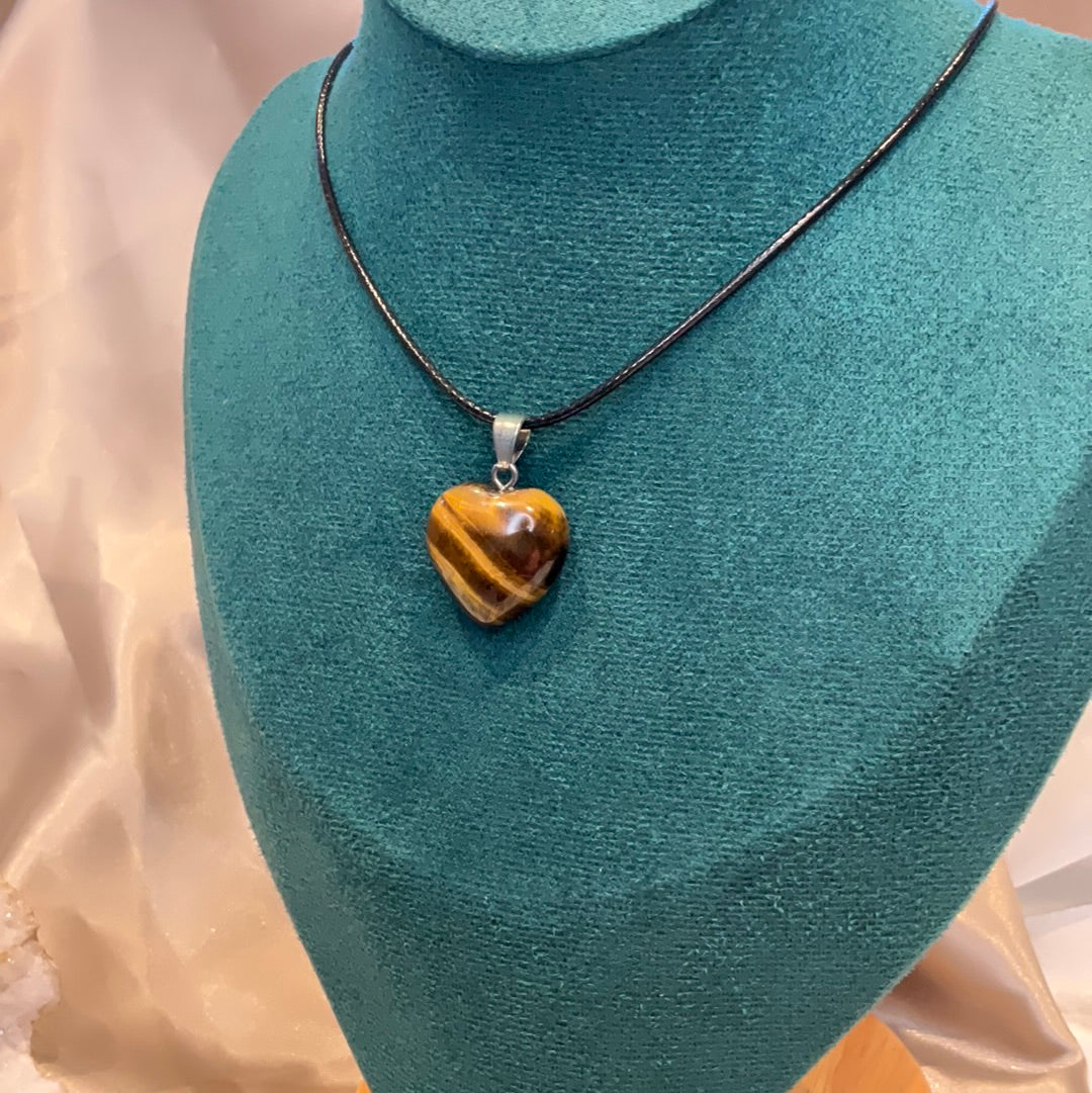 Tiger Eye Heart crystal pendant on black cord