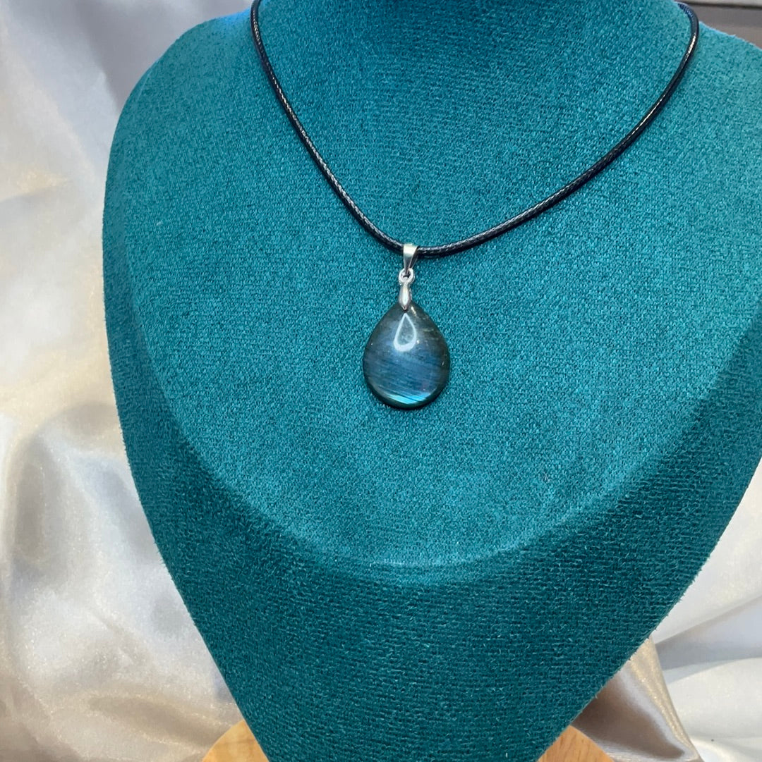 Labradorite drop pendant on black leather cord necklace. Lovely flash to this Labradorite gemstone.