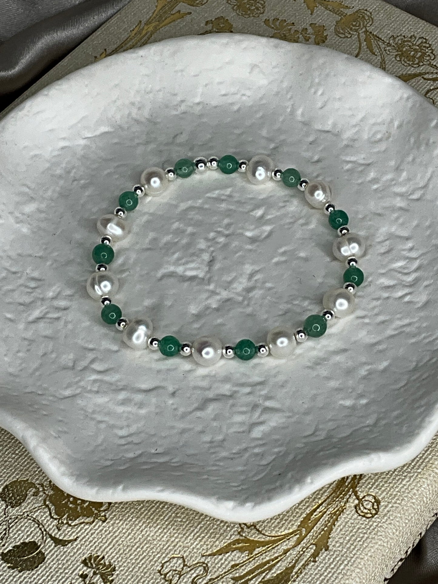 Sterling Silver Beads, Fresh Water Pearls and Green Aventurine Crystal stretch bracelet.