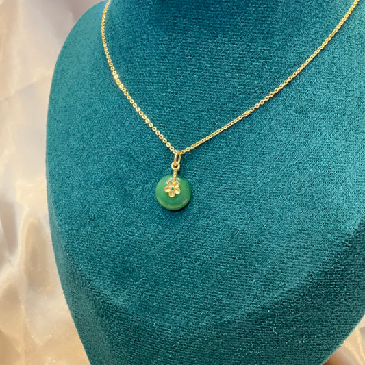 Jade pendant on gold plated chain