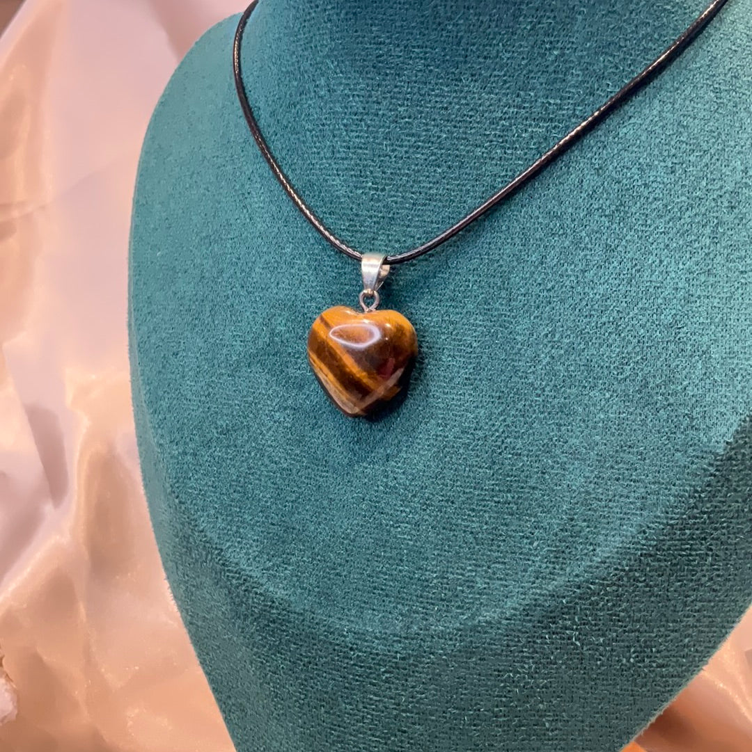 Tiger Eye Heart crystal pendant on black cord