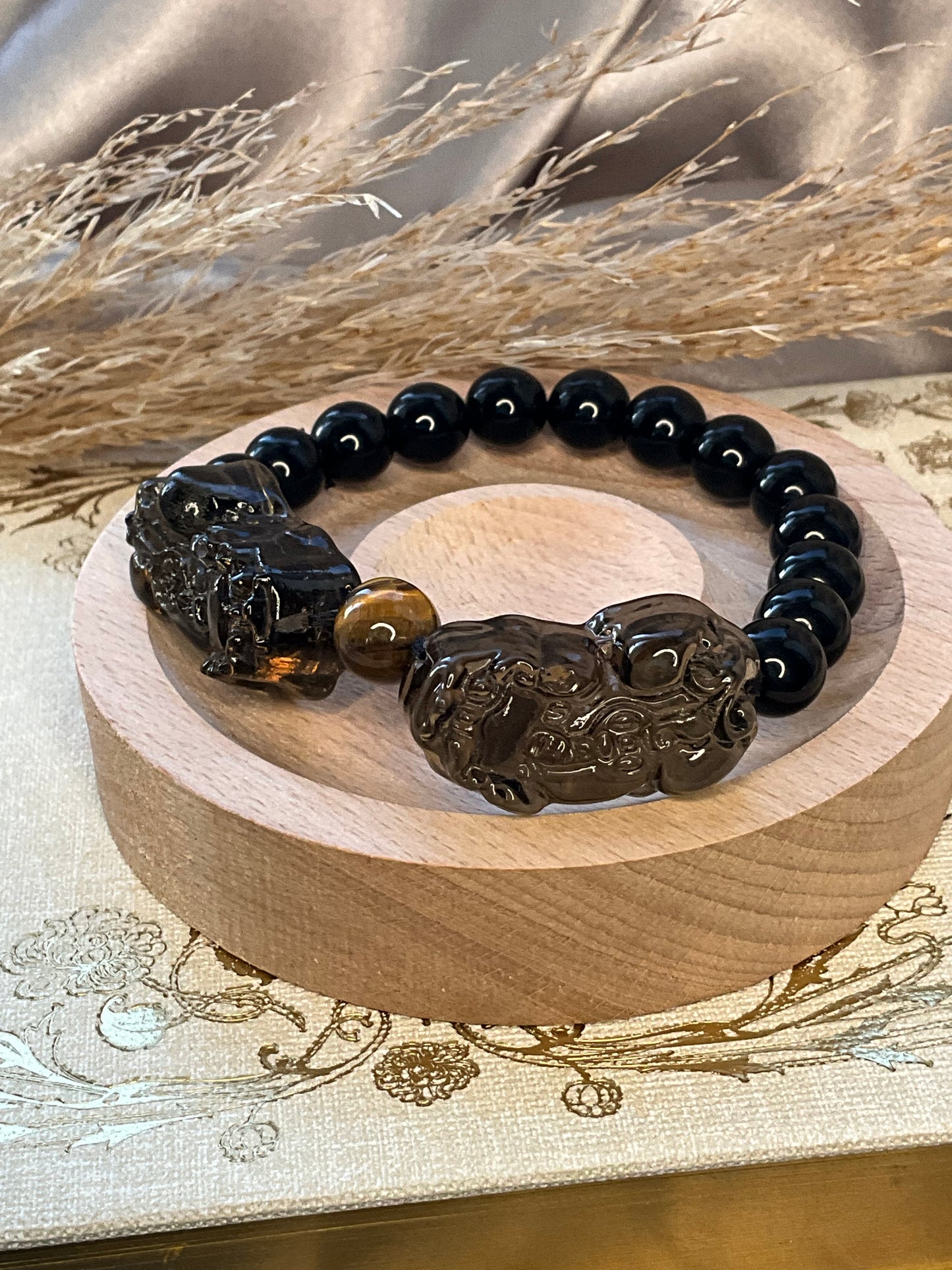 Men’s Obsidian bead bracelet with Smokey x2 Pixiu and a tigers eye bead in centre