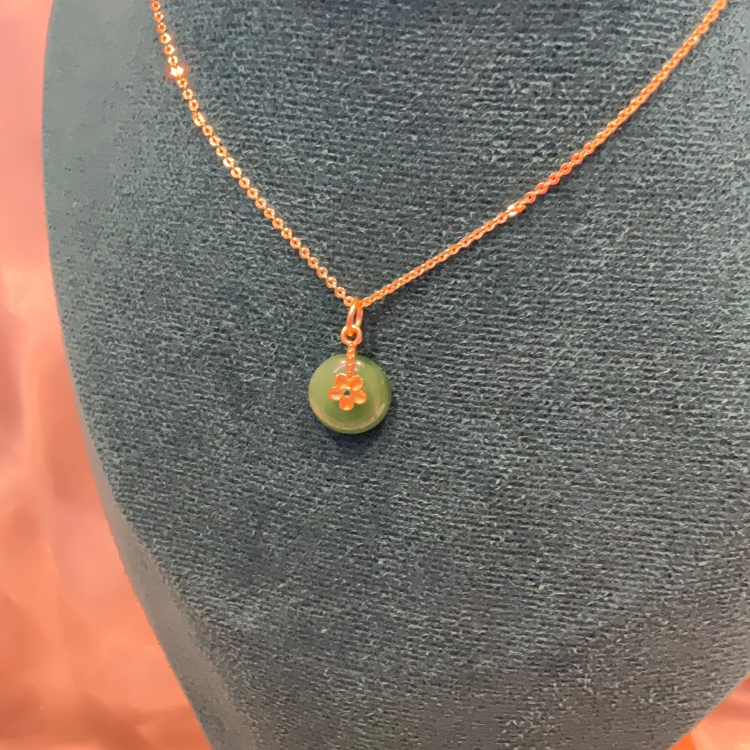 Jade pendant on gold plated chain