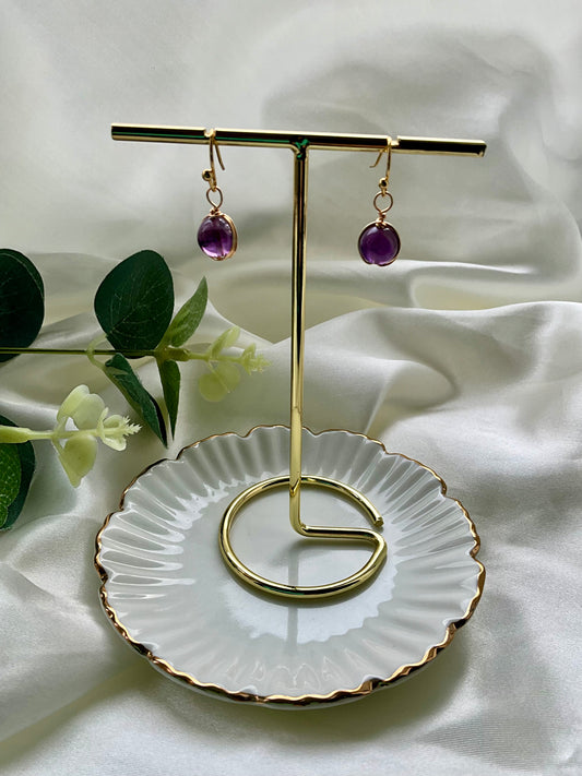 Amethyst sphere earrings wrapped in gold plating. Earring hooks are 925 sterling silver plated.