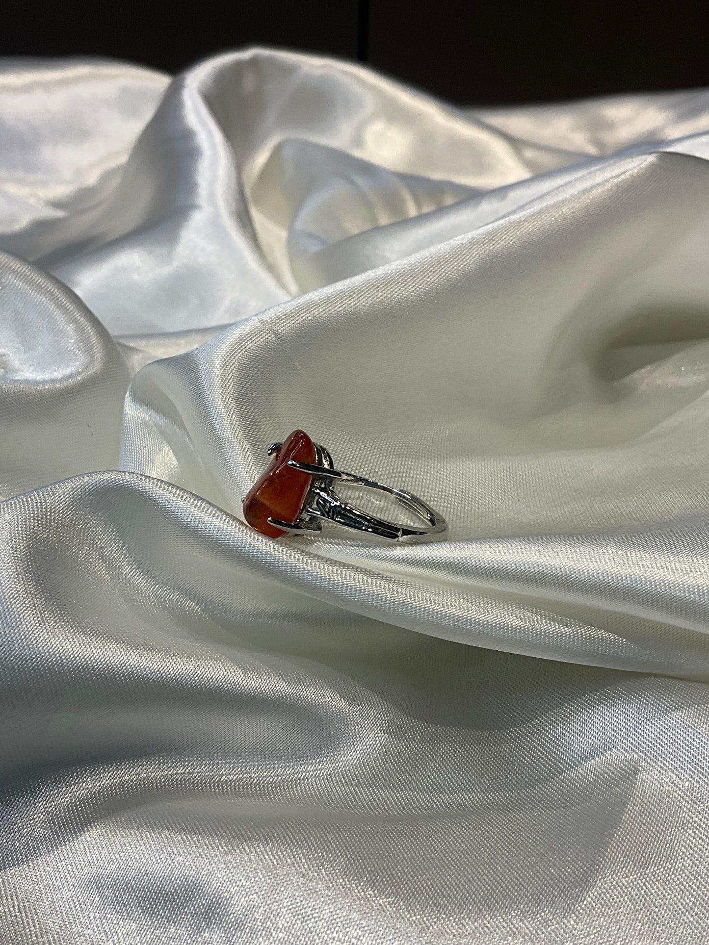 Sunstone chip in claw adjustable silver plated ring